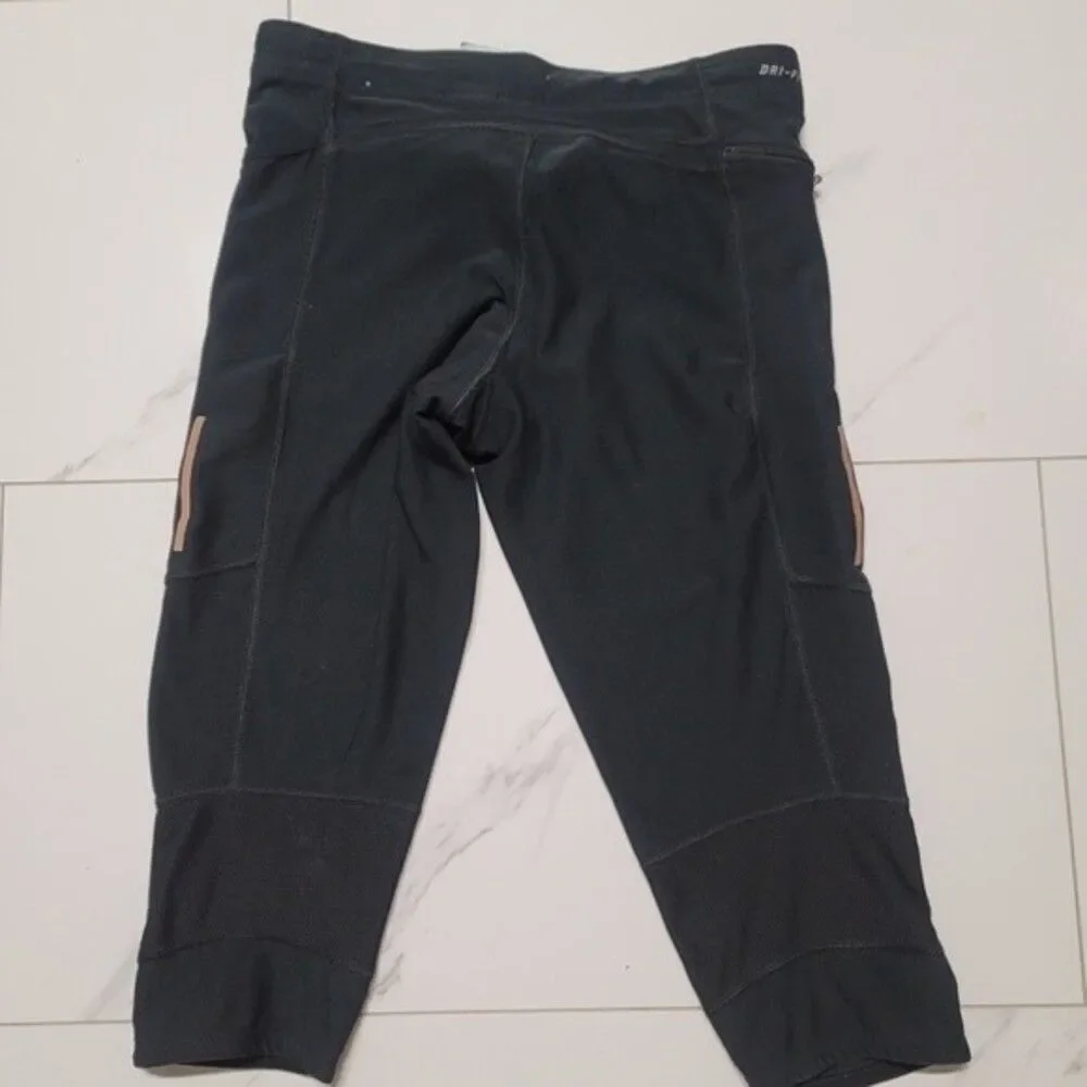 ~ womens nike dri fit running athletic capris - size M